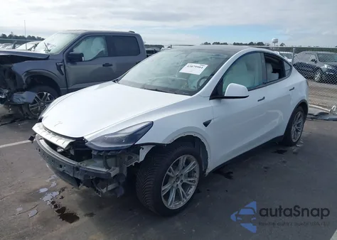 2023 Tesla Model Y Awd/Long Range Dual Motor All-Wheel Drive z USA, uszkodzony, nr VIN 7SAYGAEE4PF856425